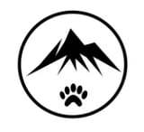 Mountain peak with paw print inside a circle, representing outdoor adventure and wildlife